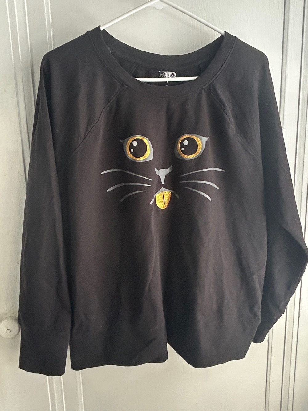 Black Cat Face Crewneck Sweatshirt with Yellow Eye Detail